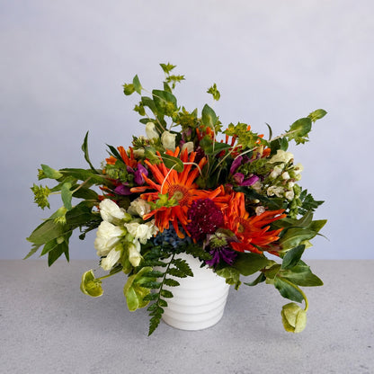 Seasonal Arrangement in Signature Ceramic Vase