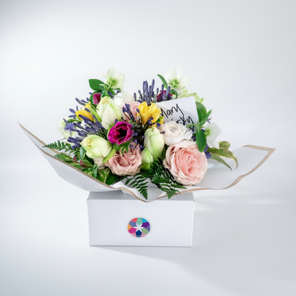 Seasonal Arrangement in Signature Ceramic Vase