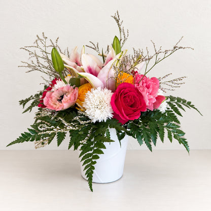Seasonal Arrangement in Signature Ceramic Vase